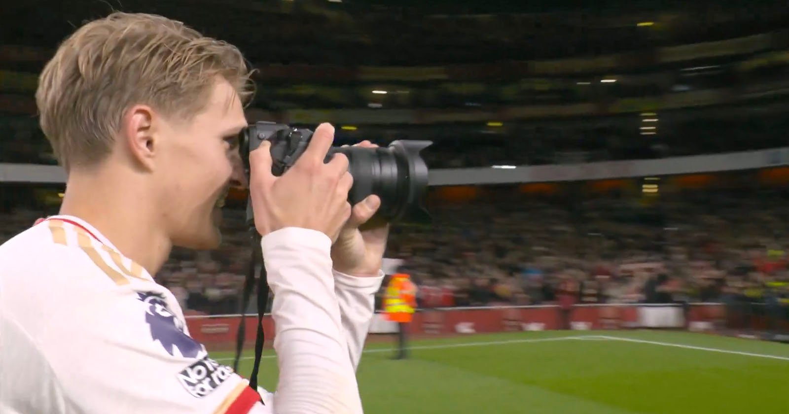 Arsenal Player Turns Photographer After English Premier League Victory