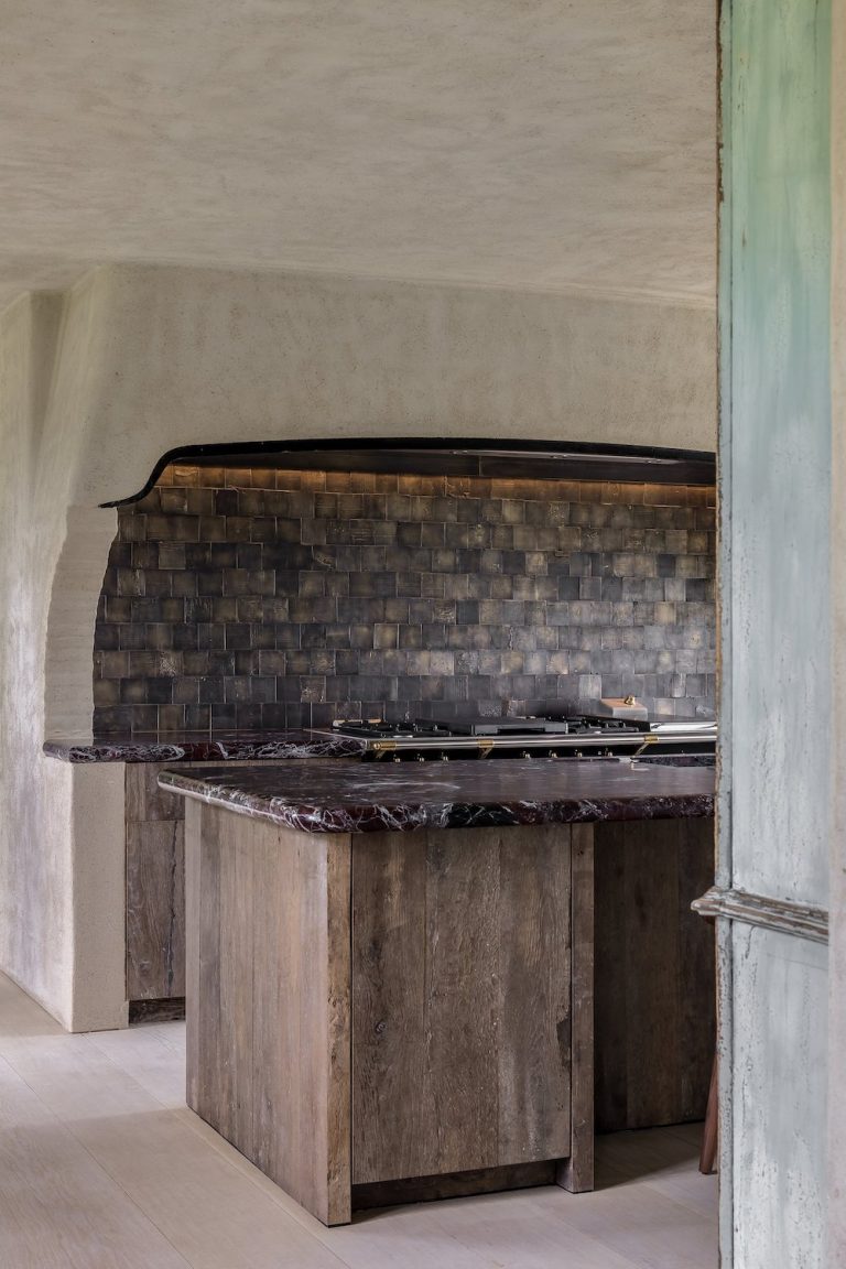 Kitchen inspiration with brass tiles and a sink by Atelier Tourain