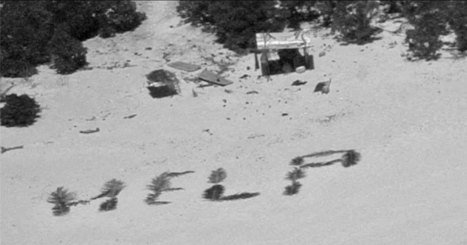 Three Stranded Men Rescued After Navy Plane Photographs ‘HELP’ Sign on Beach