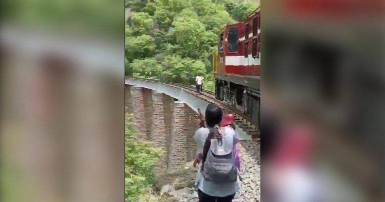 Couple Posing for Photos on Railway Bridge Jump Into 90ft Gorge to Avoid Train