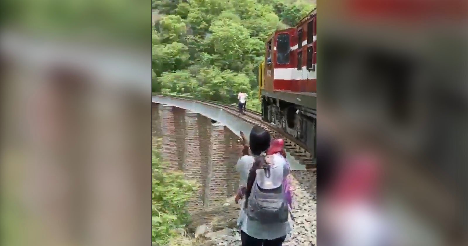 Couple Posing for Photos on Railway Bridge Jump Into 90ft Gorge to Avoid Train