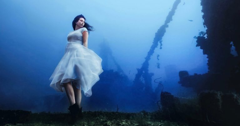 Photographer Captures Model 163 Feet Underwater, Setting New Record