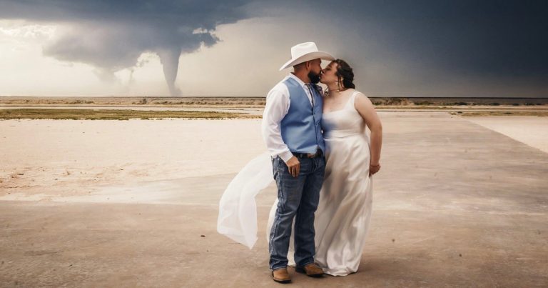 Wedding Photographer Captures Epic Shot of Bride and Groom During Tornado