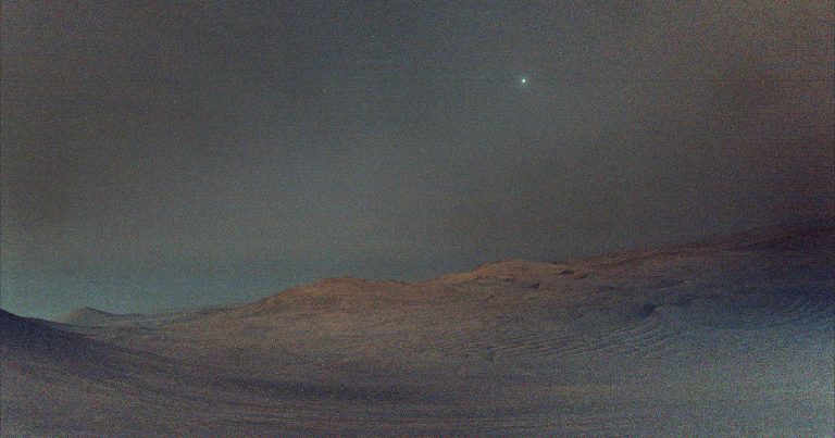 Perseverance Captures Martian Moon Shining in the Sky Before Sunrise