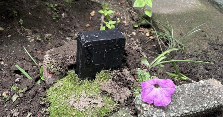 NYC Homeowner Finds Hidden Phone Camera Covered in Duct Tape Buried in Front Lawn