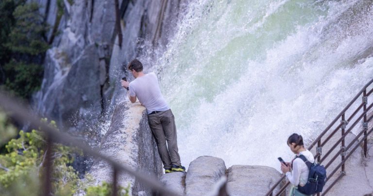 Tourist Risks Life for Photo at Edge of Powerful Yosemite Waterfall