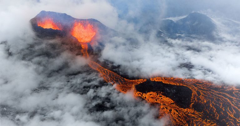 Photographer Captures Dreamy Photos of Volcanic Eruption During a Rainstorm