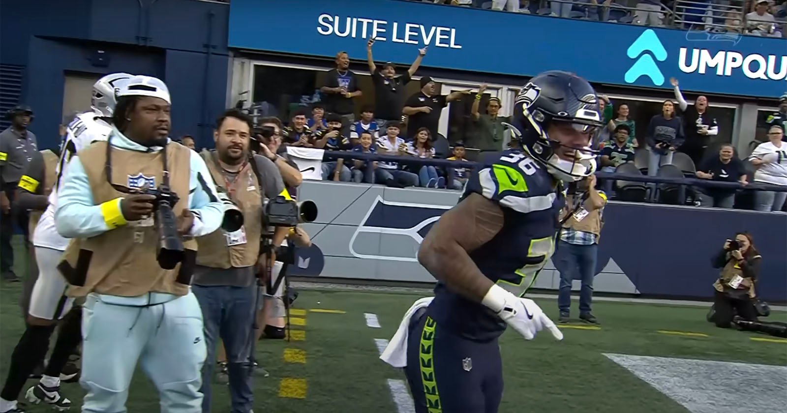 Former NFL Running Back Marshawn Lynch Spotted in Official Photographer Role Former NFL Running Back Marshawn Lynch Spotted in Official Photographer Role