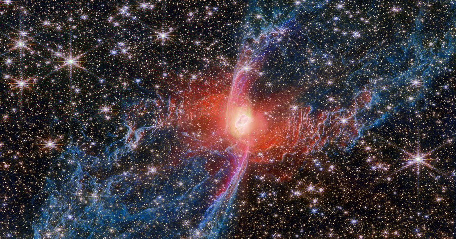 Webb Embraces Spooky Season With Red Spider Nebula Portrait